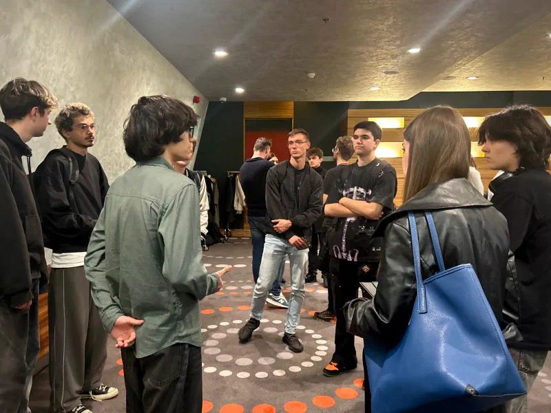 Vasonim team members talking with attendees at a conference